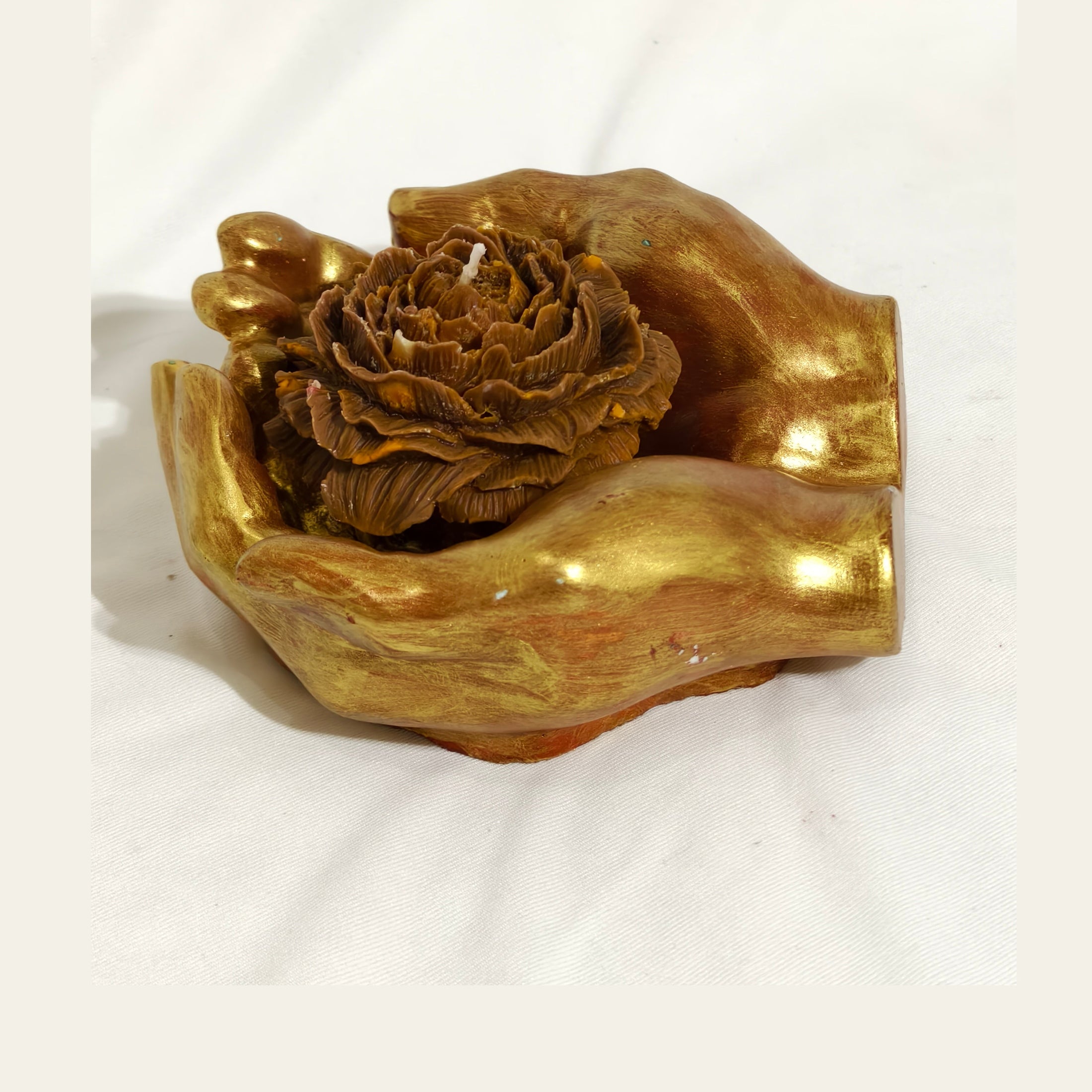 Golden Bloom Candle in Hand Sculpture