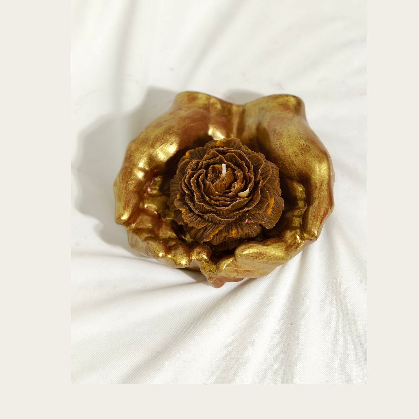 Golden Bloom Candle in Hand Sculpture